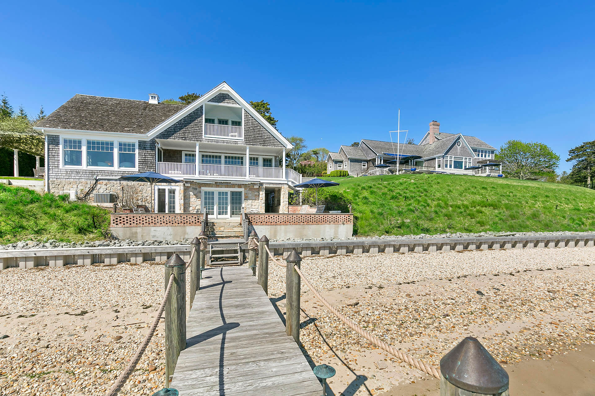 Guest house with a dock and beach in The Hamptons